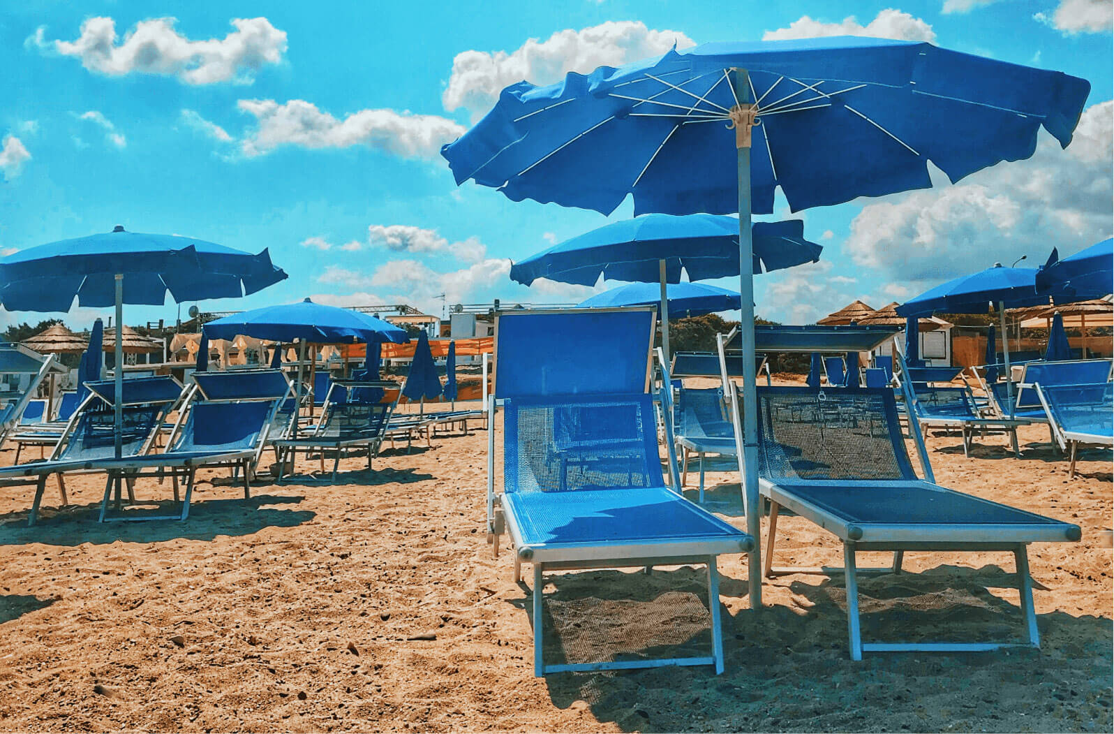 beach-chairs-clouds-1427721@2x